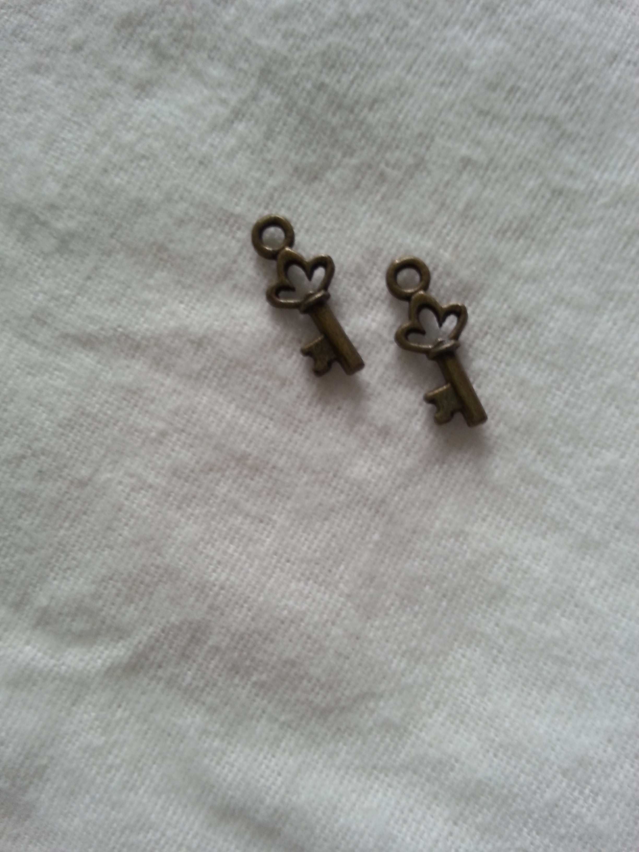 Antique Bronze Mini Key Charm