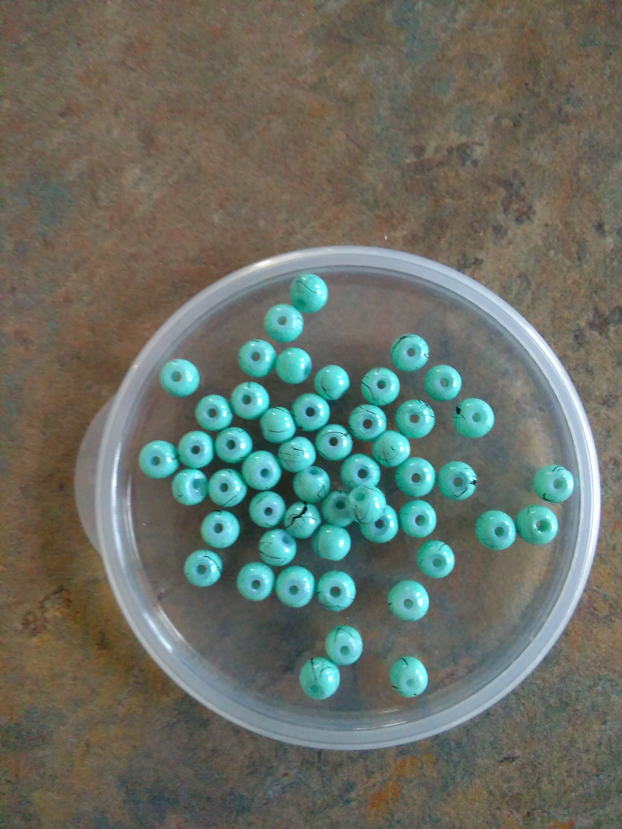 Glass 4mm Seafoam/Black streak bead