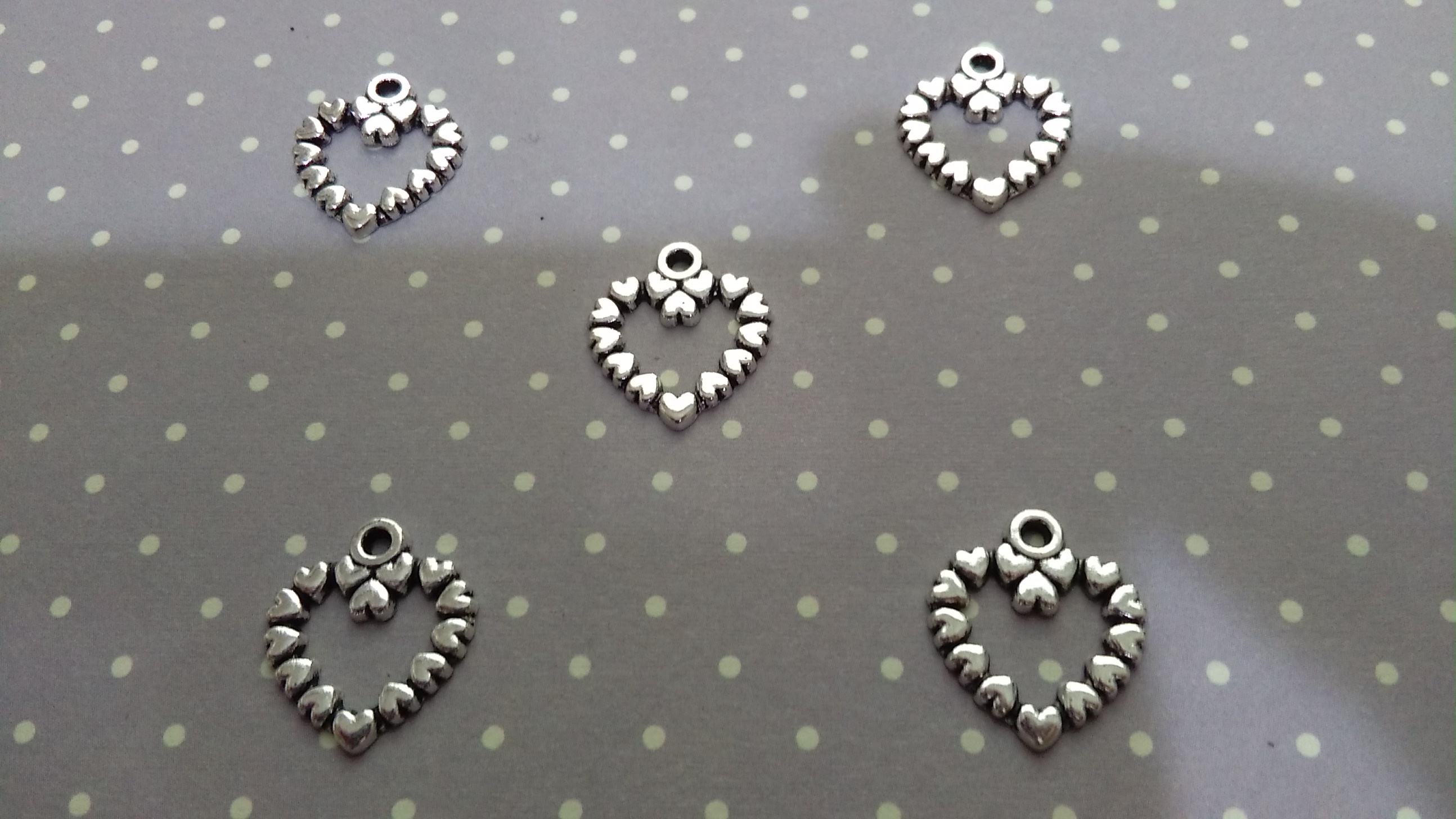 Tibetan Silver Heart with Heart Surround 15mm Charms